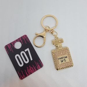 Champagne Gold Purfume Bottle Key Chain